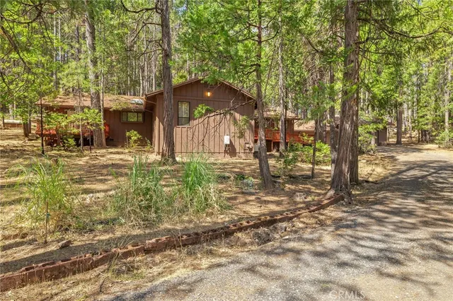 a view of a kitchen with a sink and cabinets
