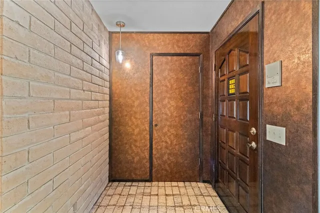 a bathroom with a bathtub sink and mirror