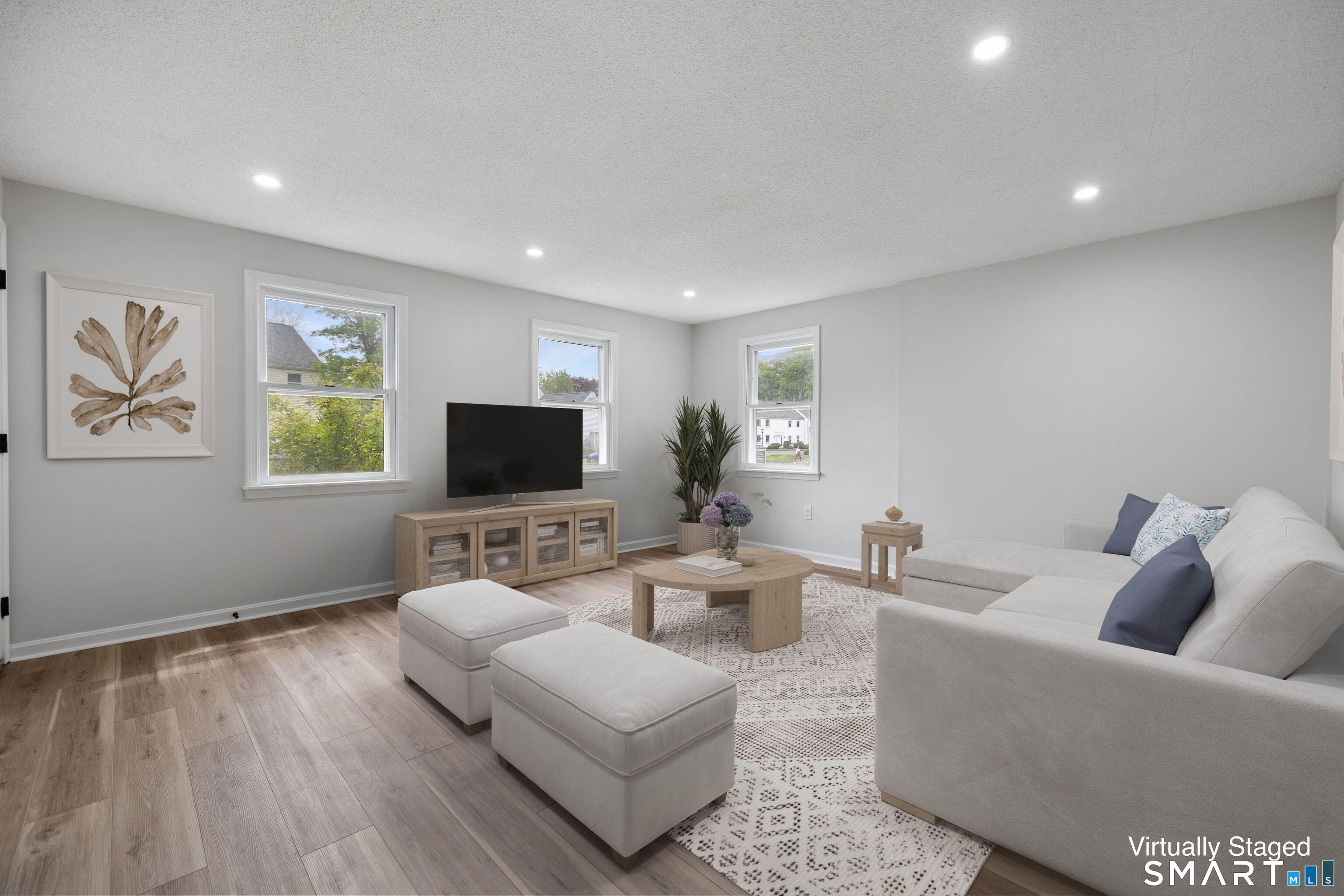464 Dowd Avenue, Unit 464 Canton, CT 06019 - Photo 5 of 31 Living room - virtually staged