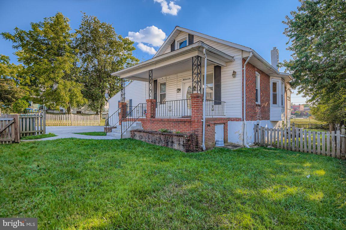 5710 Highgate Drive Baltimore, MD 21215 - Photo 1 of 28 a view of a house with a yard and deck