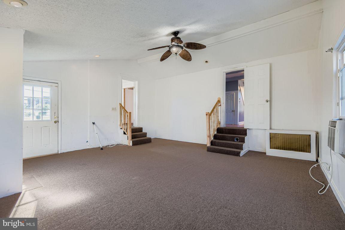 5710 Highgate Drive Baltimore, MD 21215 - Photo 15 of 28 a view of empty room with windows