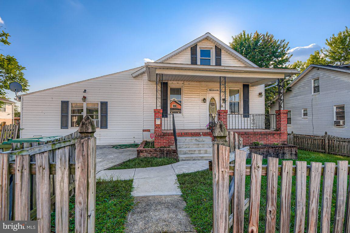 5710 Highgate Drive Baltimore, MD 21215 - Photo 2 of 28 a front view of house with wooden fence