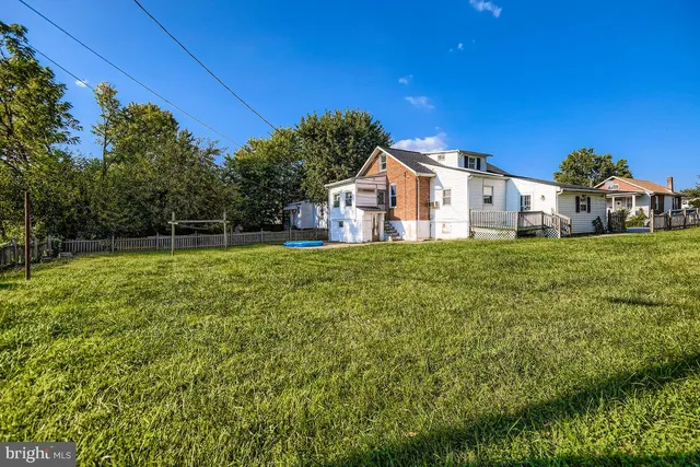 a view of a house with a big yard