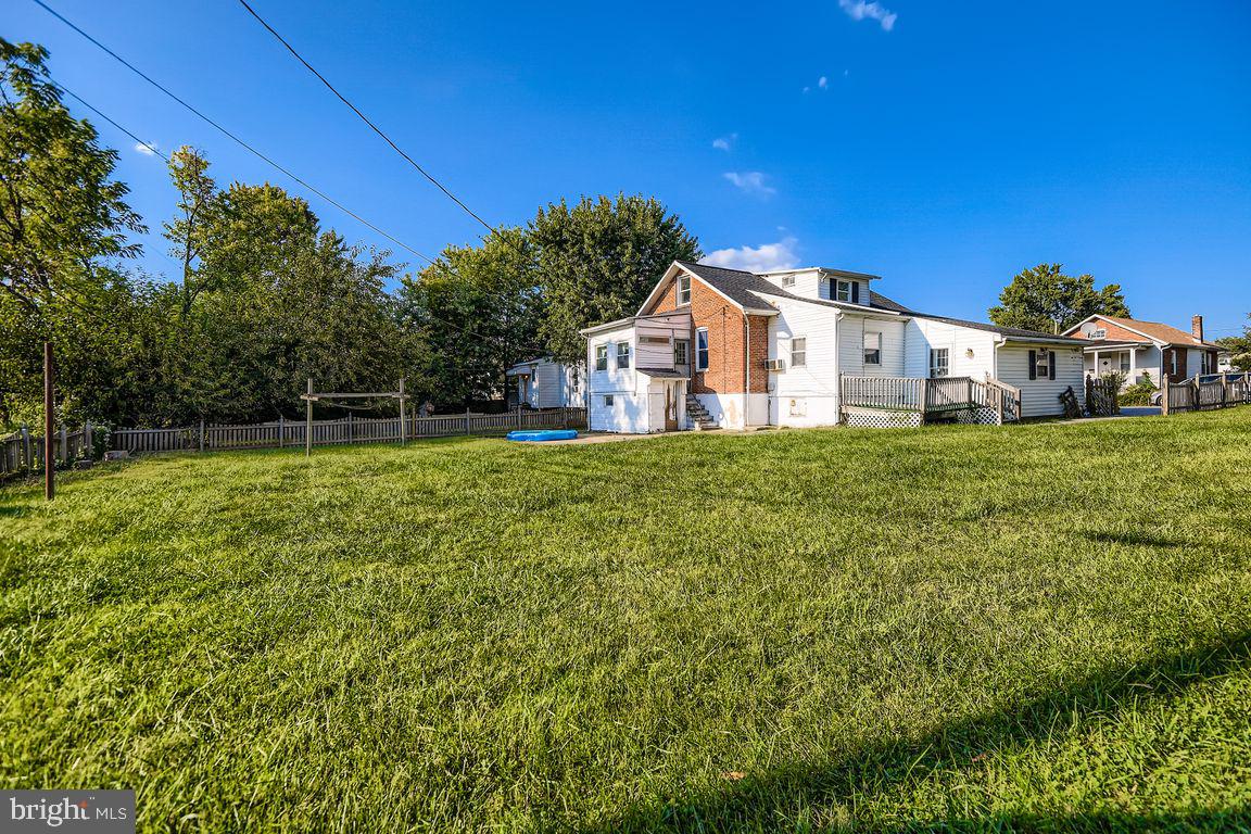 5710 Highgate Drive Baltimore, MD 21215 - Photo 27 of 28 a view of a house with a big yard