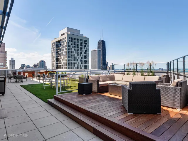 a view of a terrace with sitting area
