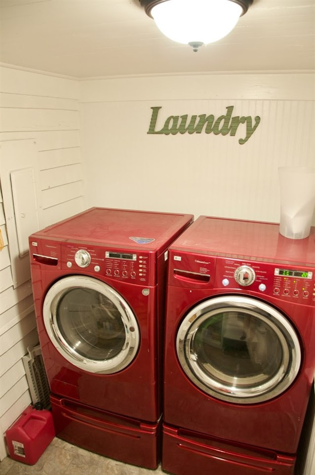 2120 Mary Hobby Road Raleigh, NC 27603 - Photo 6 of 30 Laundry Room also serves as "mud-room" from side back entry of home which leads into kitchen. Original Bead-board. The LG washer and dryer are only 2 years old. Front Loading and YES, they do convey Laundry/Mud Room