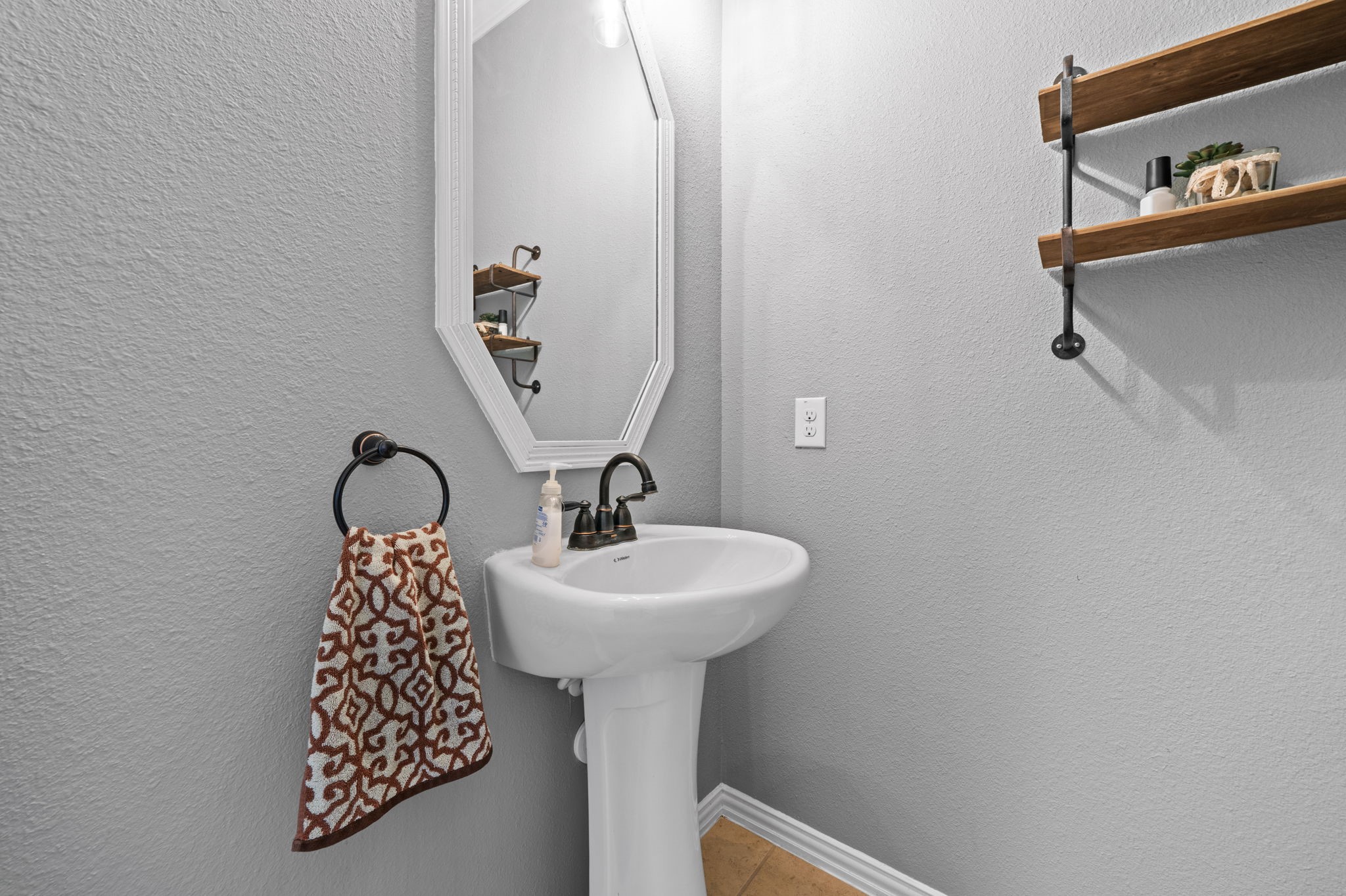 30707 Dodson Trace Drive Spring, TX 77386 - Photo 17 of 43 a bathroom with a sink a toilet and mirror
