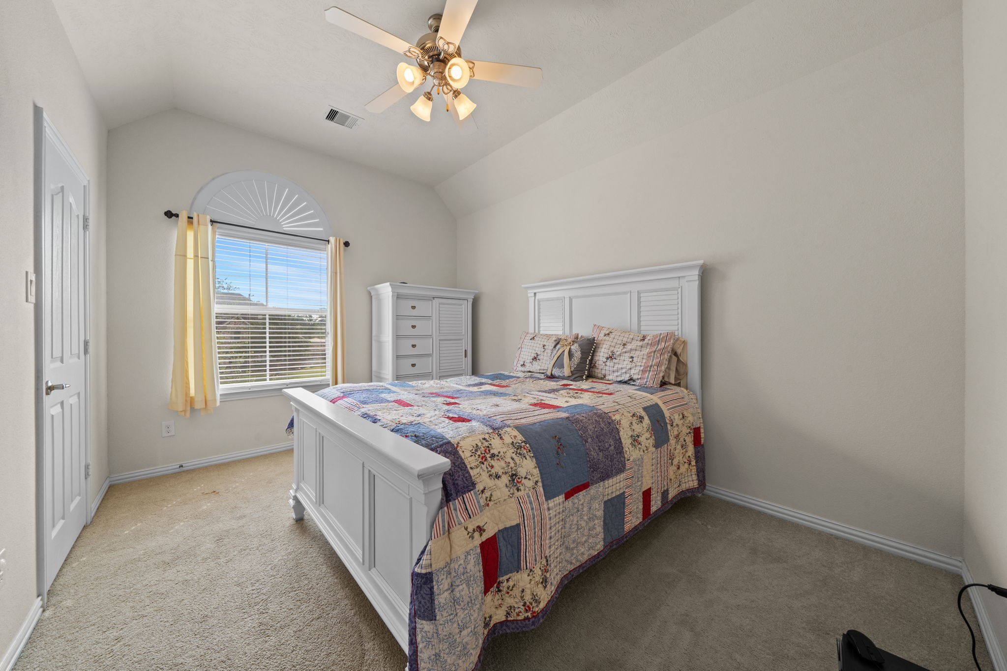 30707 Dodson Trace Drive Spring, TX 77386 - Photo 22 of 43 a spacious bedroom with a bed and a window