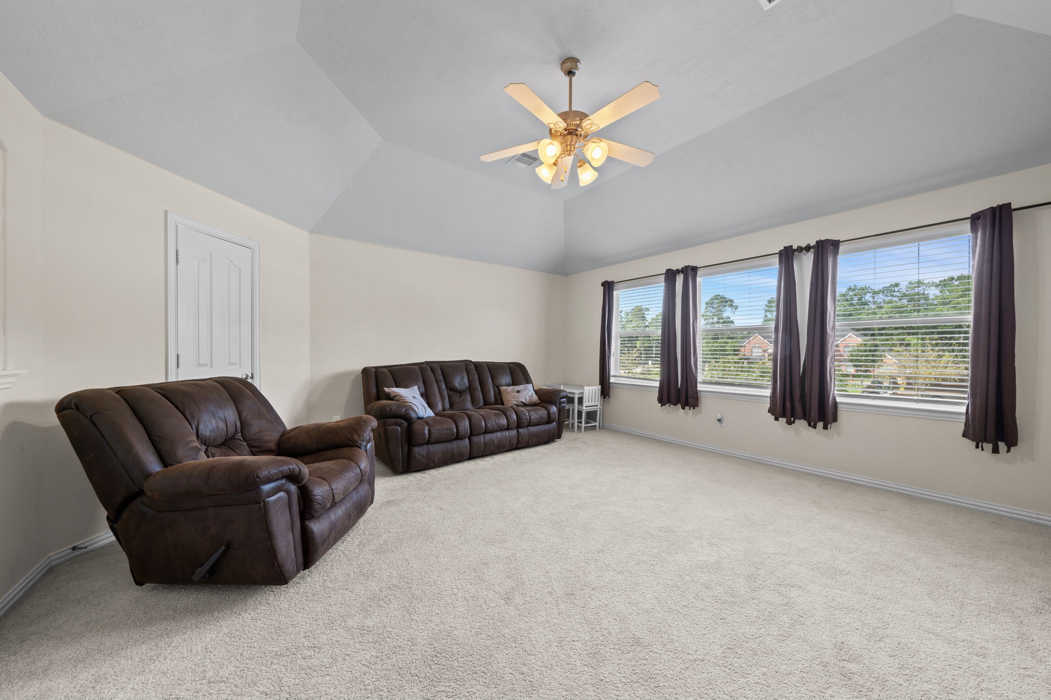 30707 Dodson Trace Drive Spring, TX 77386 - Photo 32 of 43 a living room with furniture and a large window