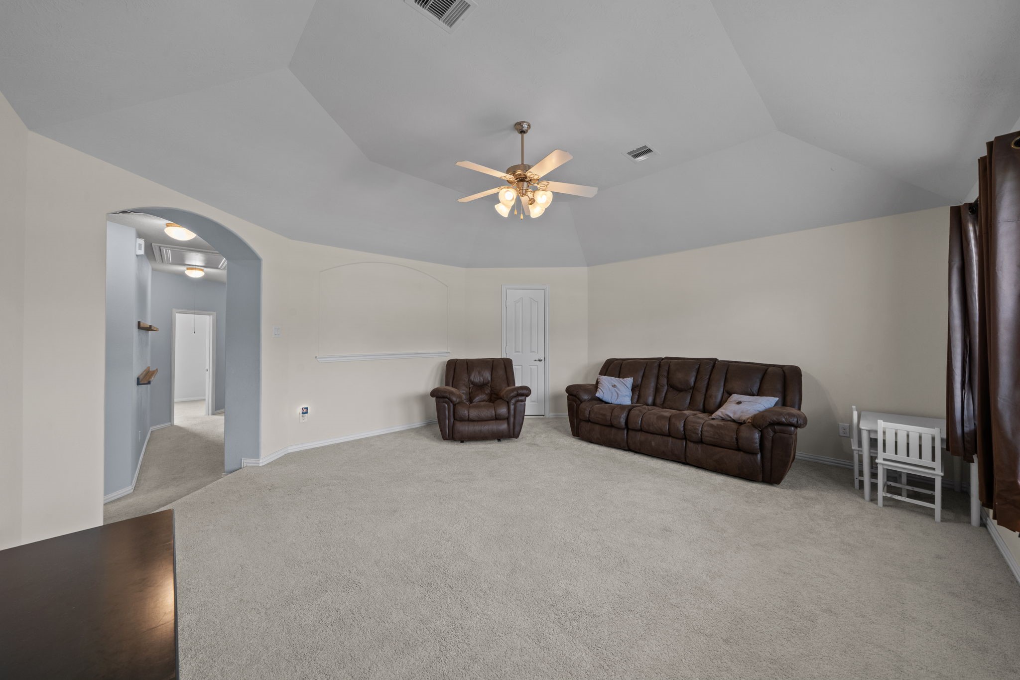 30707 Dodson Trace Drive Spring, TX 77386 - Photo 33 of 43 a living room with furniture and a chandelier
