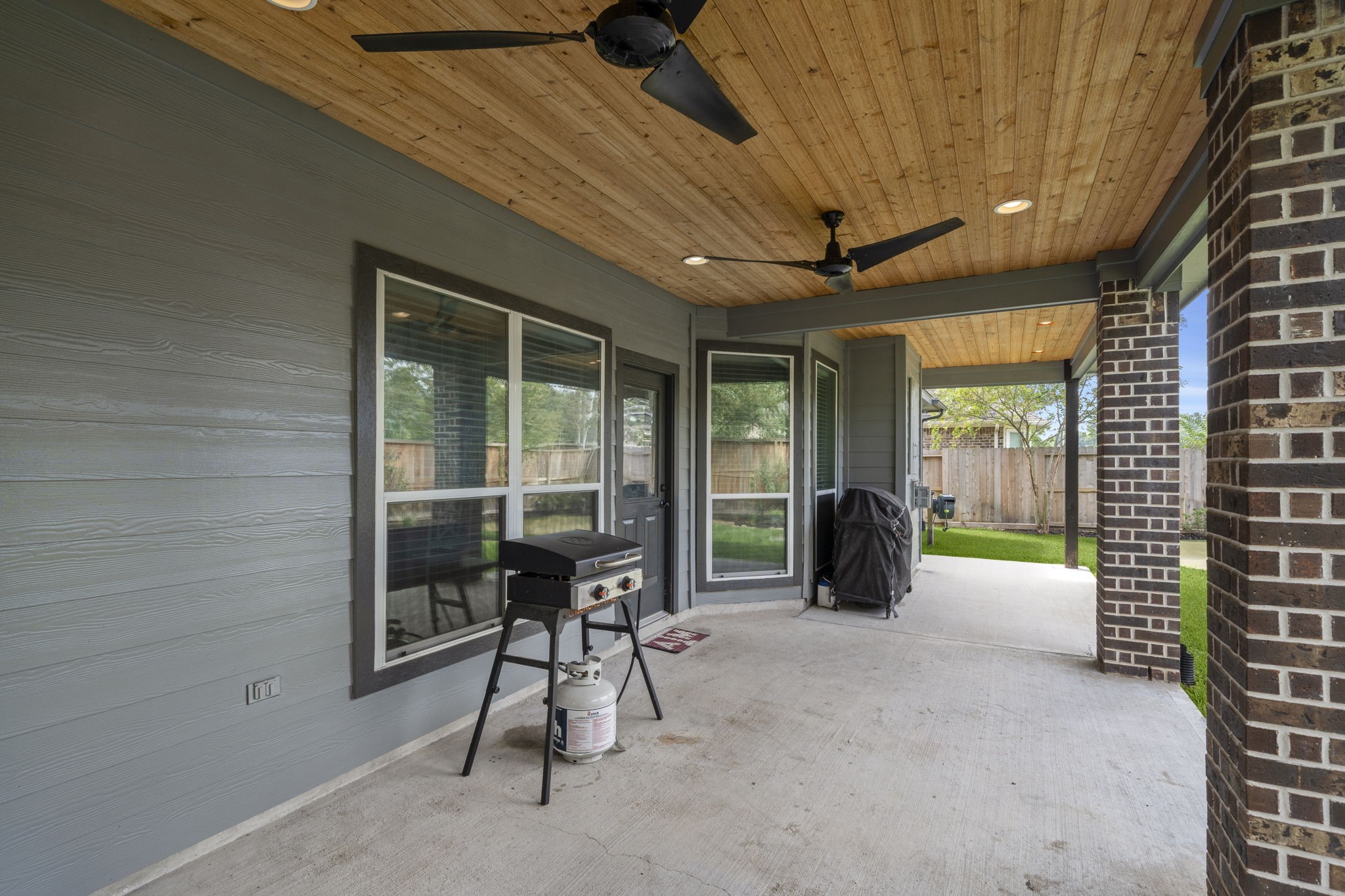 30707 Dodson Trace Drive Spring, TX 77386 - Photo 37 of 43 a view of a room with furniture and a window