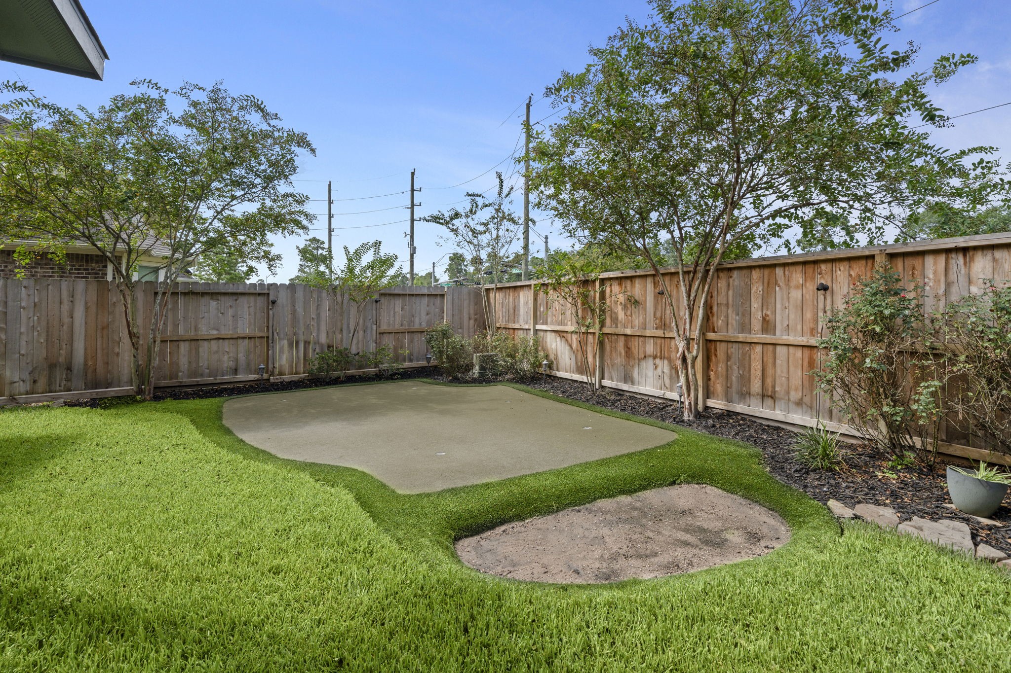 30707 Dodson Trace Drive Spring, TX 77386 - Photo 38 of 43 a view of a backyard with wooden fence