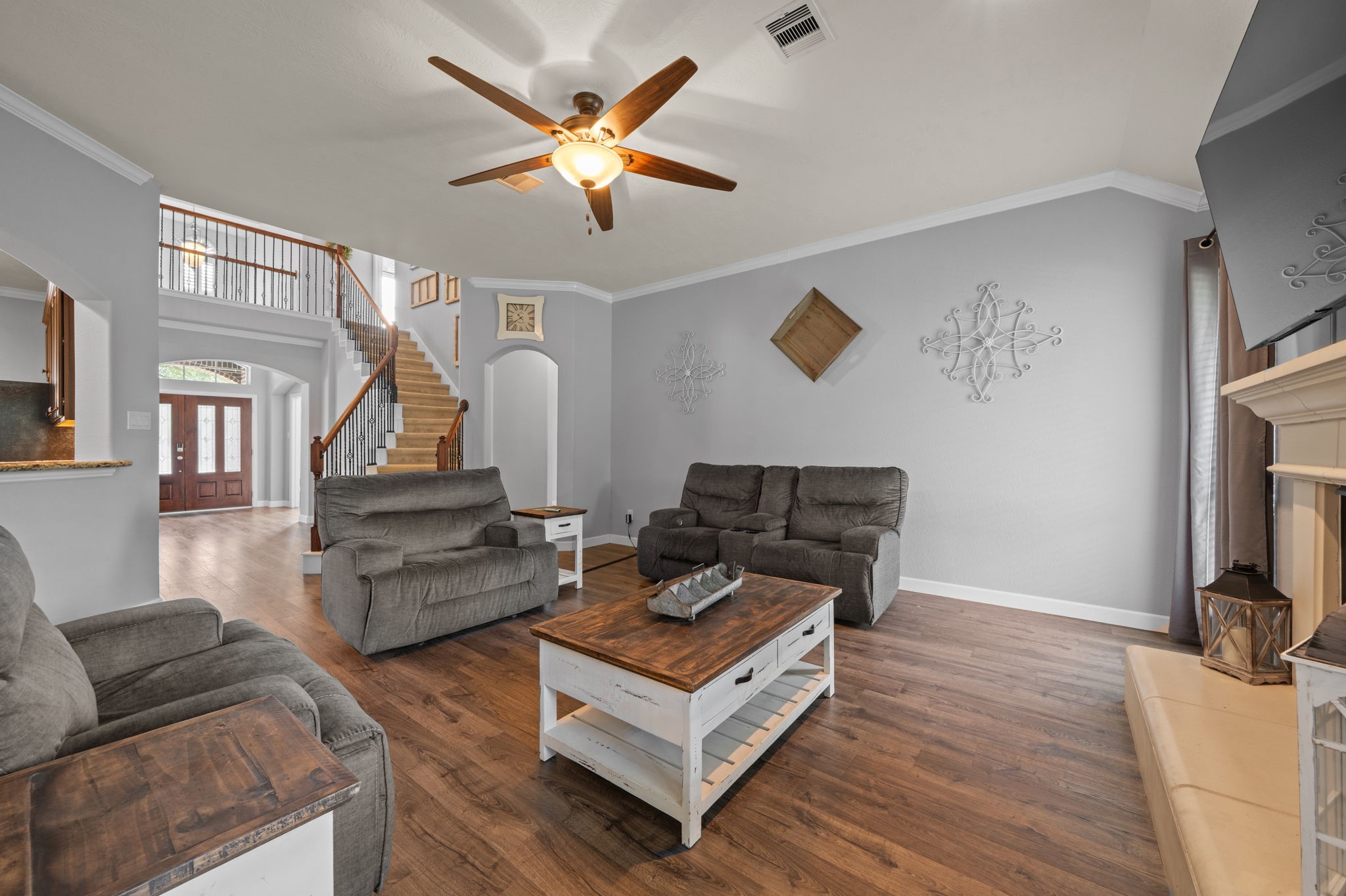 30707 Dodson Trace Drive Spring, TX 77386 - Photo 5 of 43 a living room with furniture and a fireplace