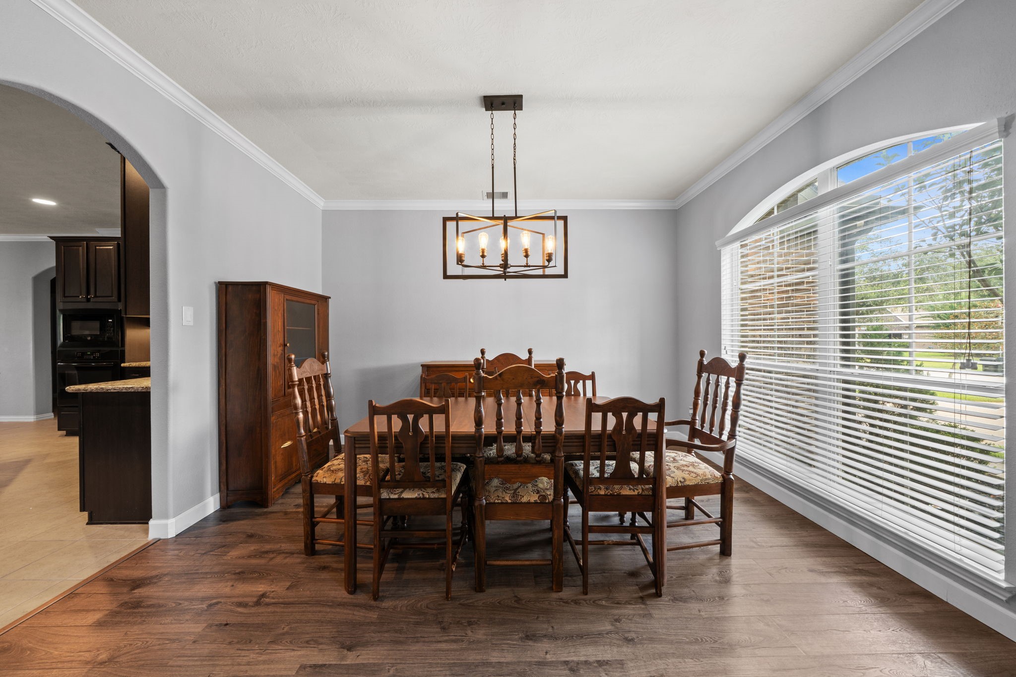 30707 Dodson Trace Drive Spring, TX 77386 - Photo 10 of 43 a view of a dining room with furniture window and wooden floor