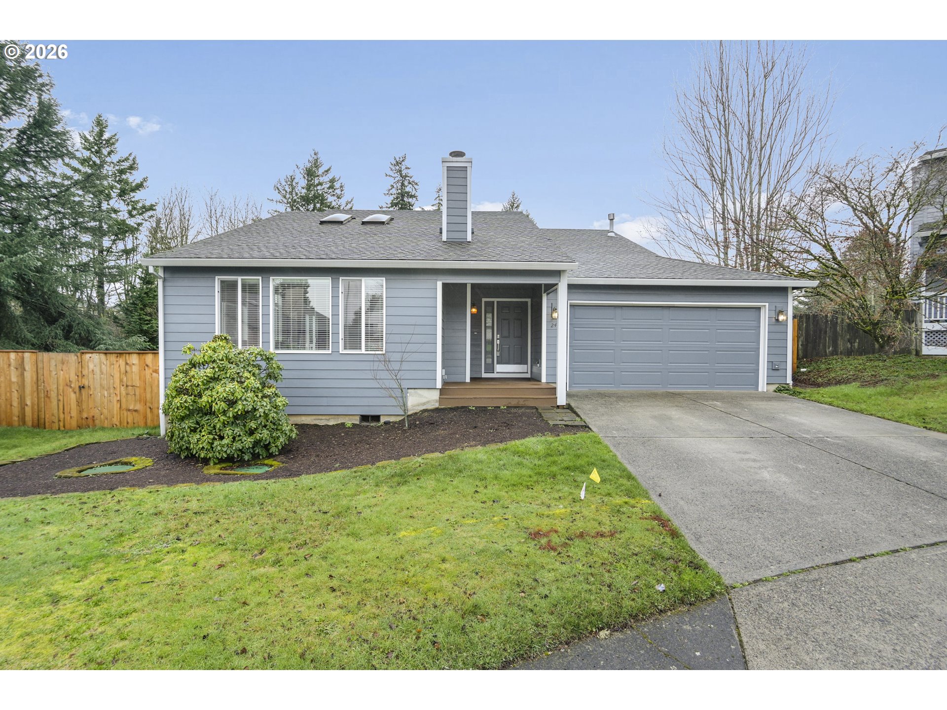 2415 Northwest Norwood Place Camas, WA 98607 - Photo 1 of 36 a front view of a house with garden