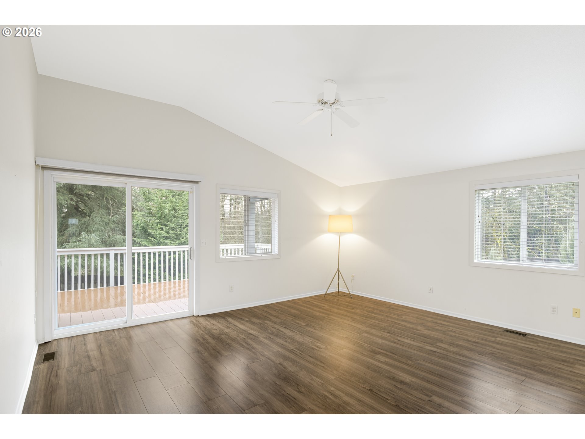 2415 Northwest Norwood Place Camas, WA 98607 - Photo 15 of 36 a view of an empty room with wooden floor and a window