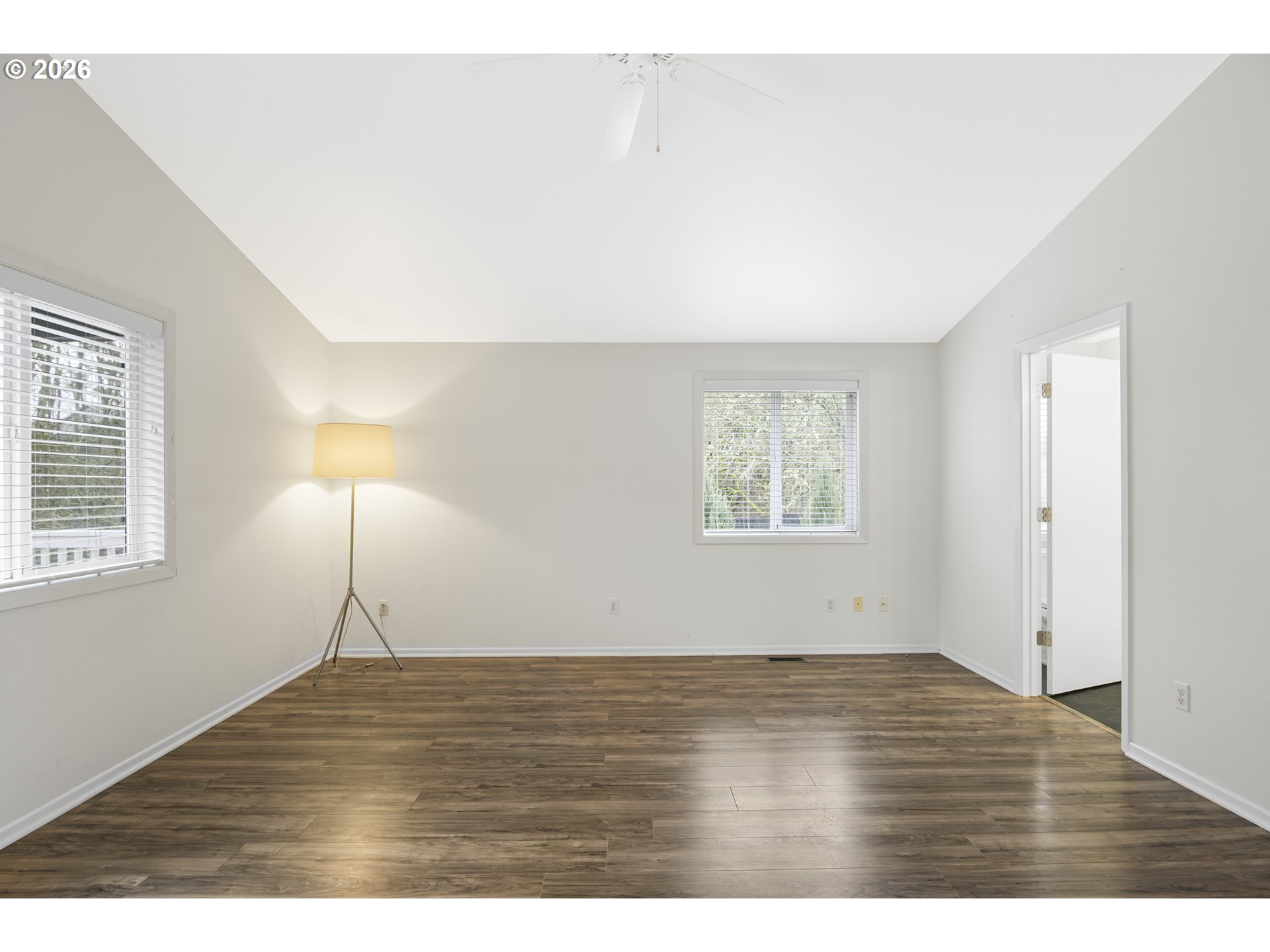 2415 Northwest Norwood Place Camas, WA 98607 - Photo 18 of 36 a view of an empty room with wooden floor and a window