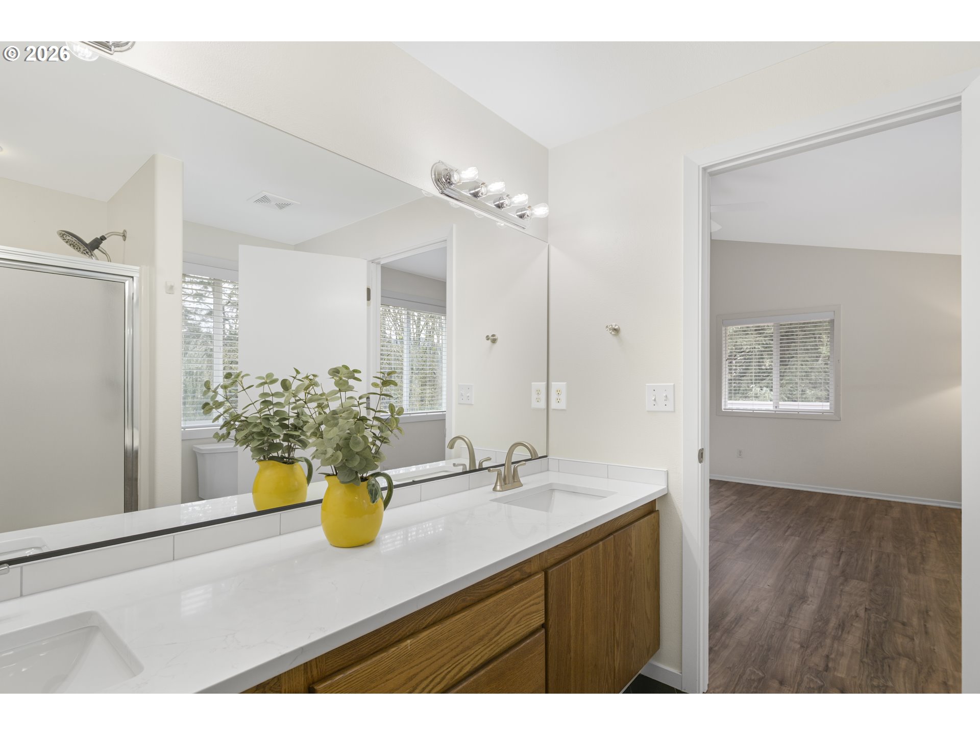 2415 Northwest Norwood Place Camas, WA 98607 - Photo 21 of 36 a bathroom with a sink a mirror and a shower