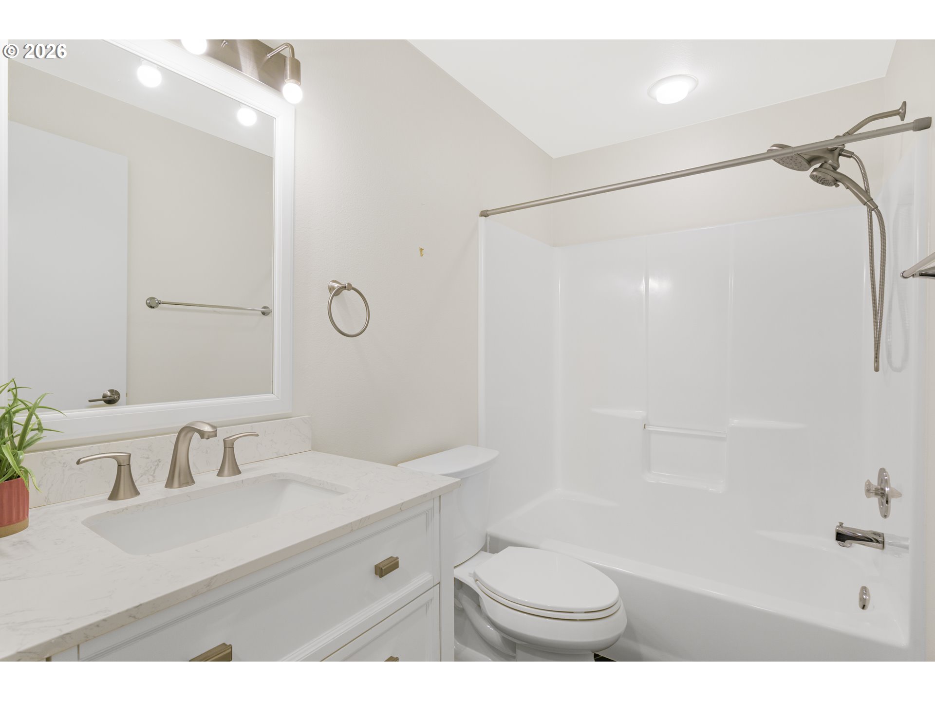 2415 Northwest Norwood Place Camas, WA 98607 - Photo 31 of 36 a bathroom with a sink vanity granite toilet and shower