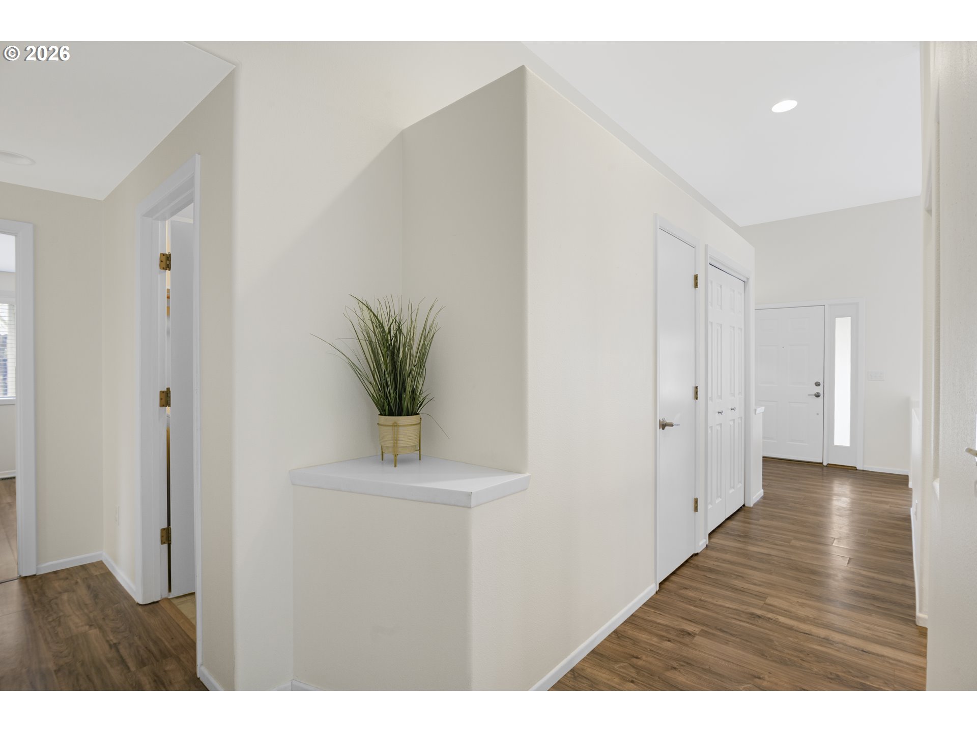 2415 Northwest Norwood Place Camas, WA 98607 - Photo 32 of 36 a view of a hallway with wooden floor