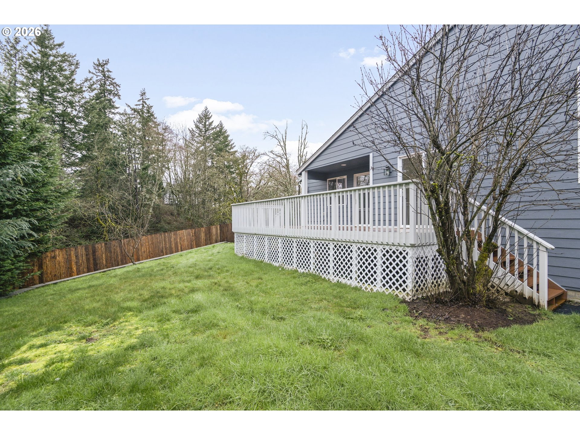 2415 Northwest Norwood Place Camas, WA 98607 - Photo 35 of 36 a view of a house with a yard and a porch