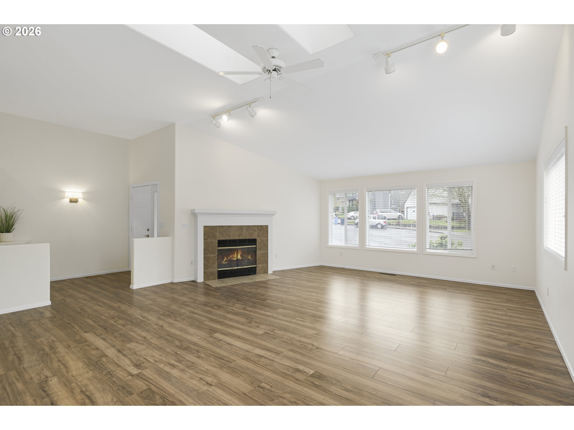 2415 Northwest Norwood Place Camas, WA 98607 - Photo 5 of 36 a view of an empty room with a window and fireplace