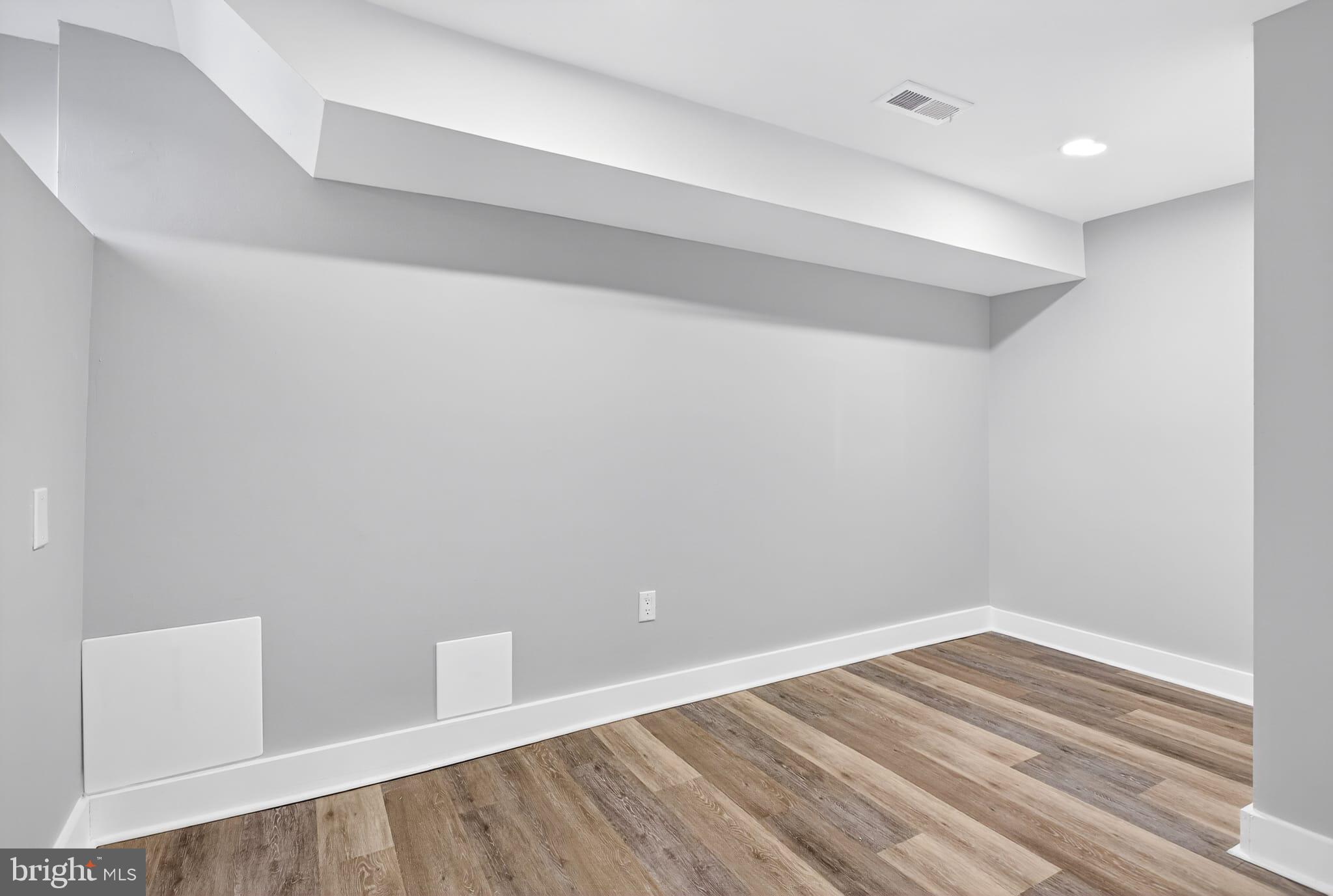 2658 South 68th Street Philadelphia, PA 19142 - Photo 25 of 36 a view of room with wooden floor