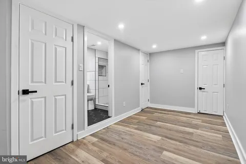 a view of entryway with wooden floor