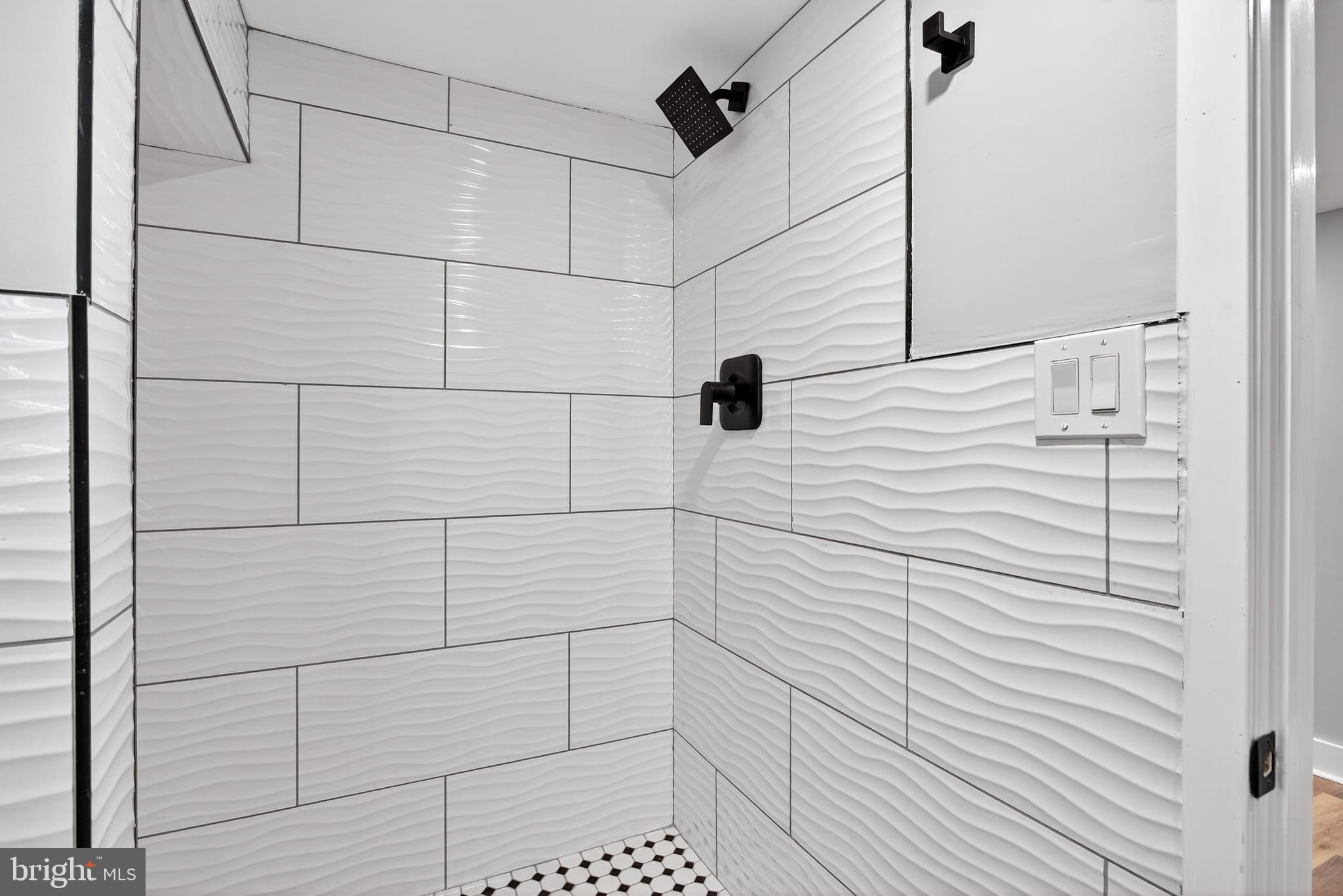 2658 South 68th Street Philadelphia, PA 19142 - Photo 30 of 36 a bathroom with a shower