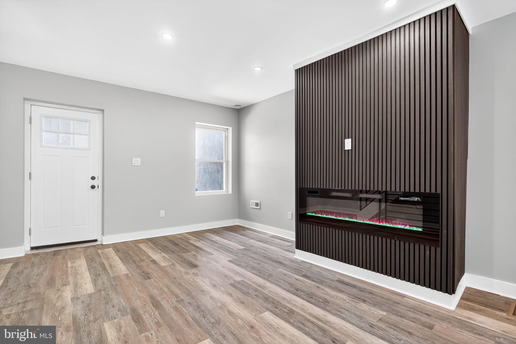 2658 South 68th Street Philadelphia, PA 19142 - Photo 5 of 36 a view of an empty room and wooden floor