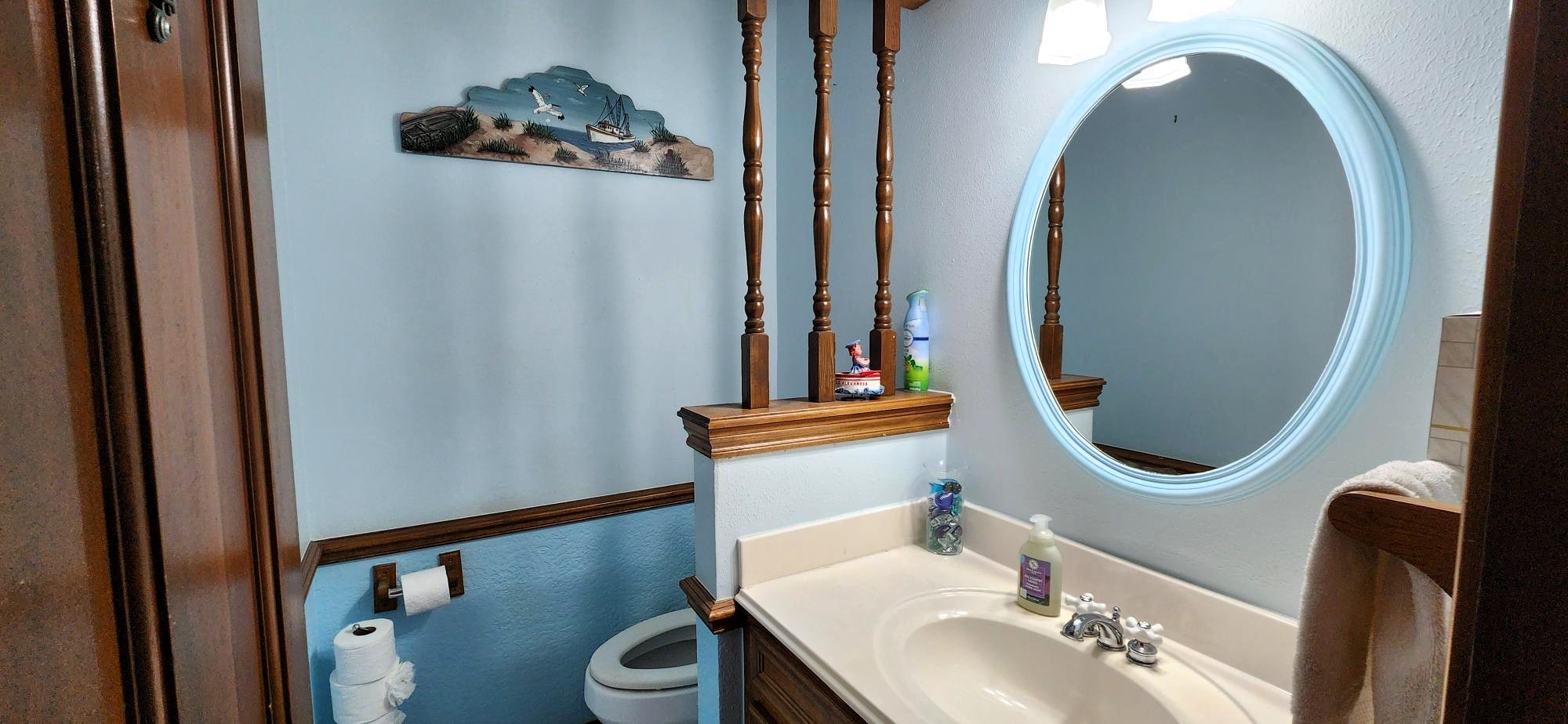 16155 Hexham Drive Spring, TX 77379 - Photo 20 of 47 a bathroom with a sink mirror and toilet
