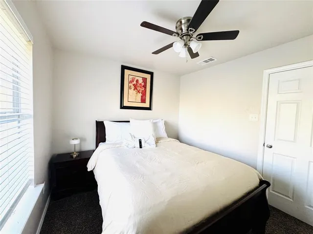 a stove top oven sitting inside of a kitchen
