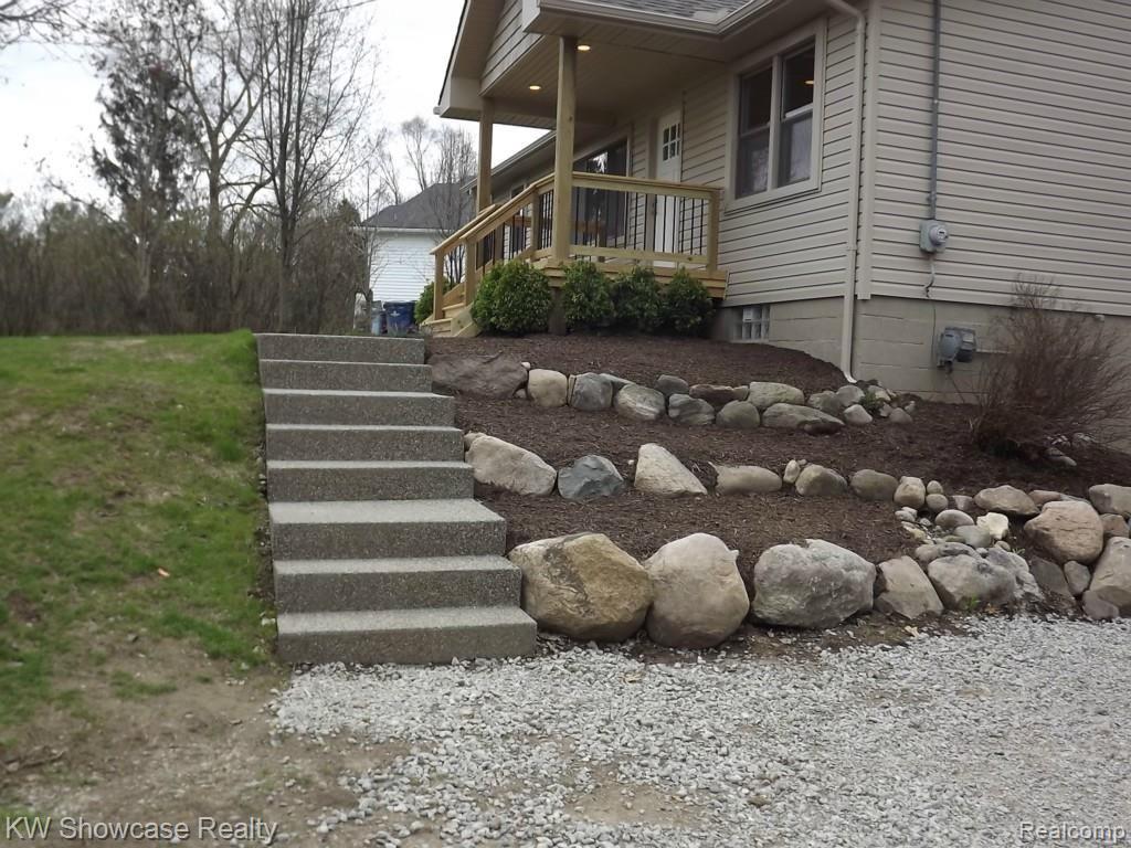 2033 Porter Road White Lake, MI 48383 - Photo 31 of 36 Incredible tiered landscaping.