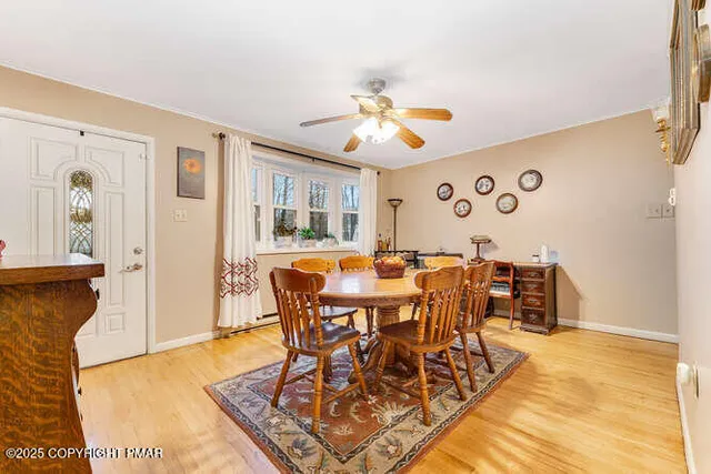 a view of a dining room with furniture