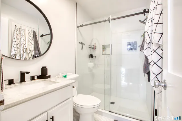 a view of street with parked cars