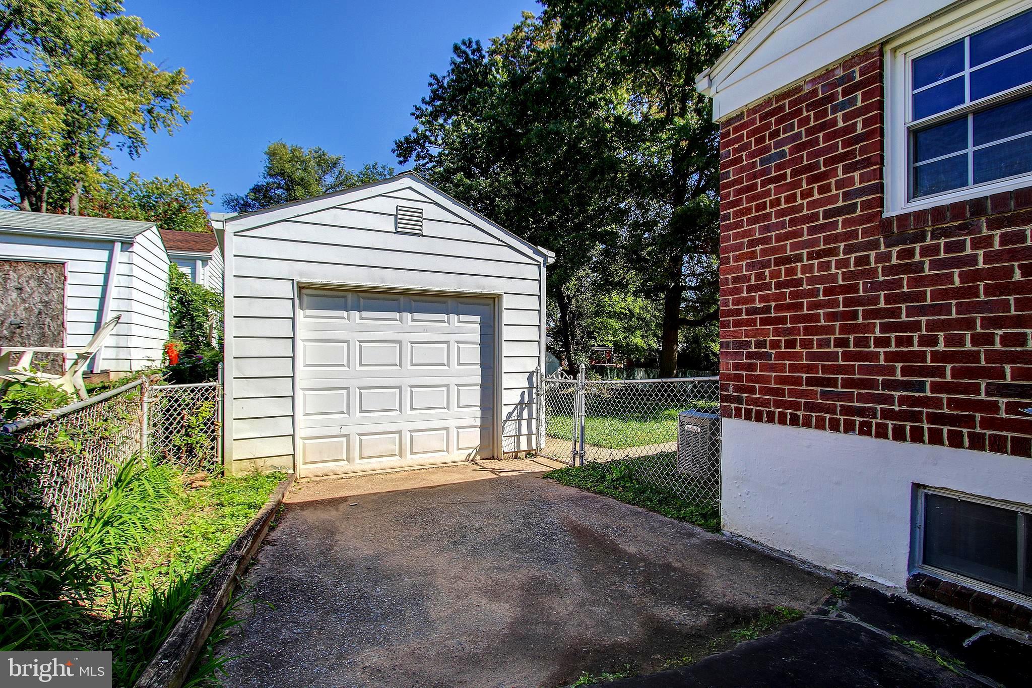 4713 Olden Road Rockville, MD 20852 - Photo 22 of 24 Paved Driveway With Large Detached Garage