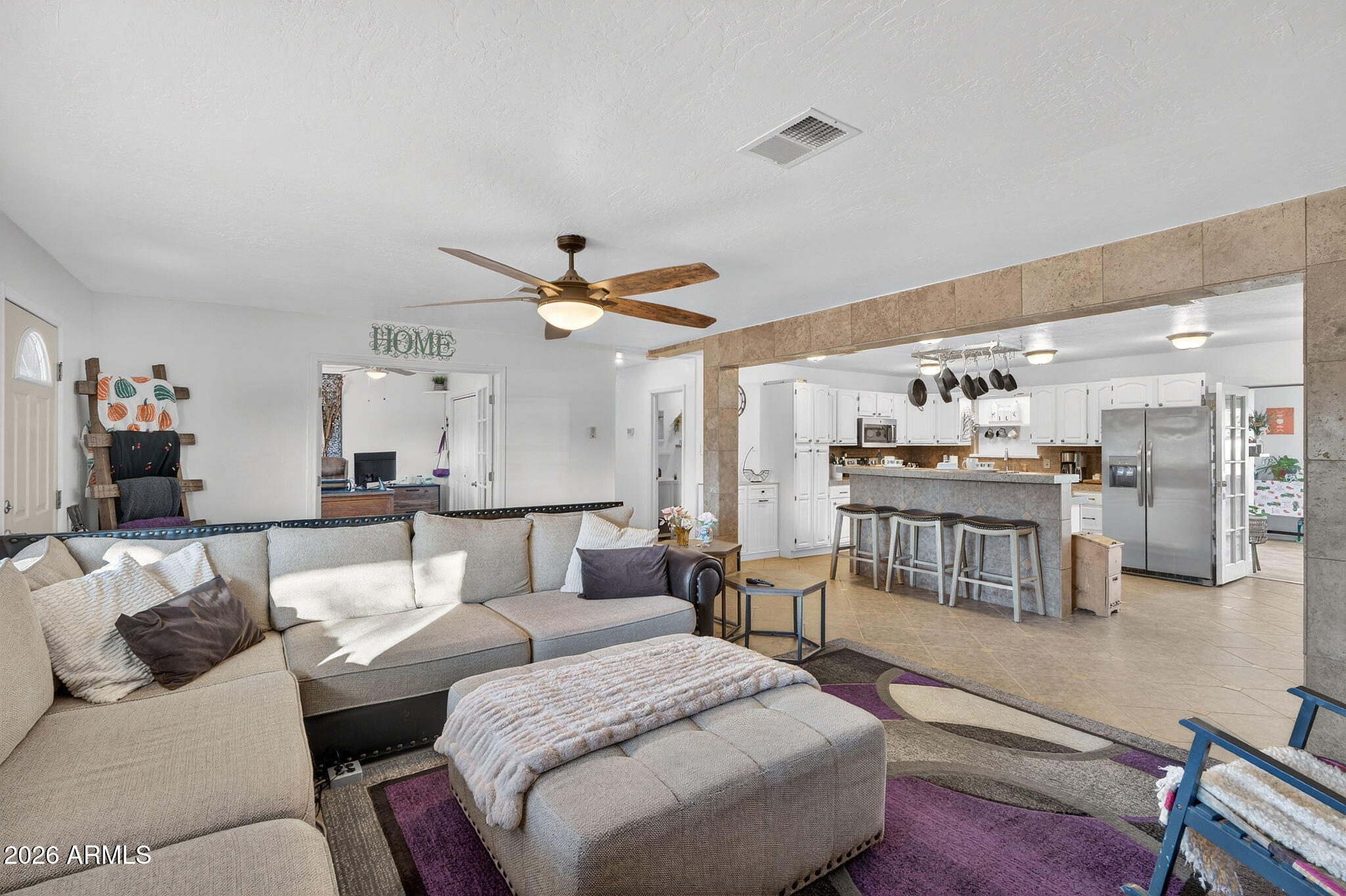 13202 West Ocotillo Road Glendale, AZ 85307 - Photo 14 of 58 a living room with furniture and a wooden floor