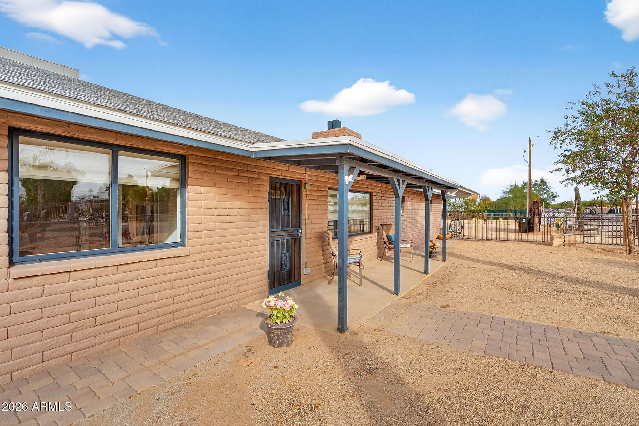 13202 West Ocotillo Road Glendale, AZ 85307 - Photo 6 of 58 a view of a house with outdoor space and sitting area