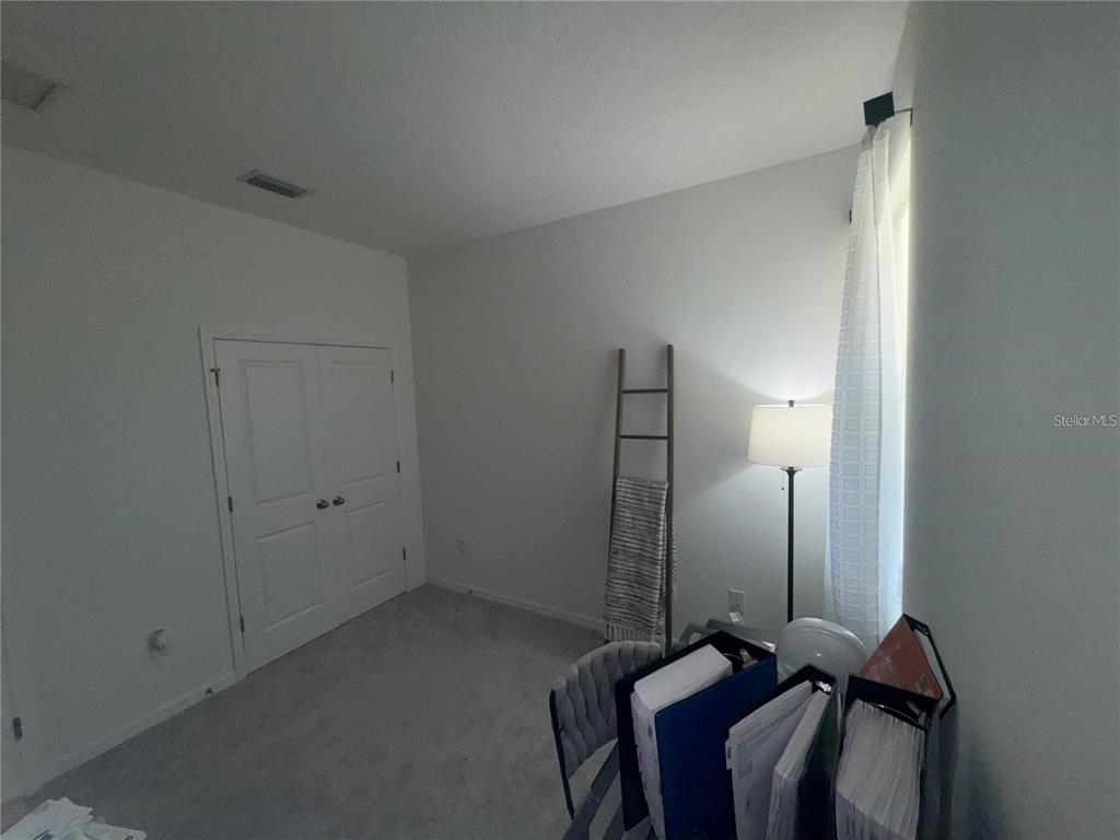4356 Reisswood Loop Palmetto, FL 34221 - Photo 13 of 17 a view of a room with a mirror