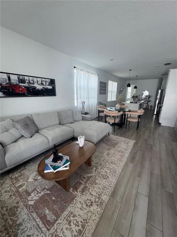 4356 Reisswood Loop Palmetto, FL 34221 - Photo 8 of 17 a living room with furniture and a couch