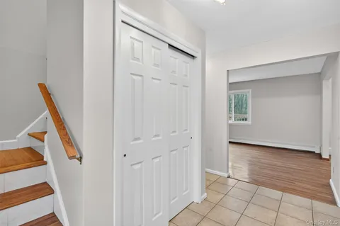 a view of an entryway with staircase