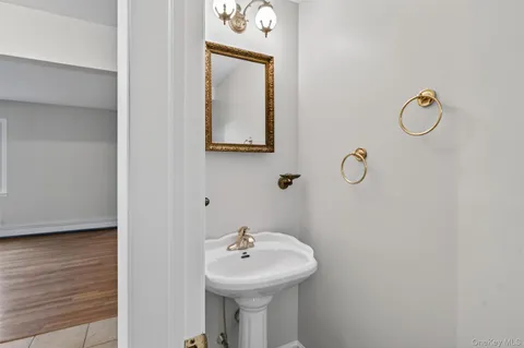 a bathroom with a sink and mirror