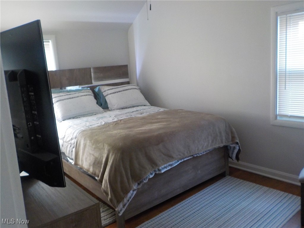 4031 Ardmore Road Cleveland, OH 44121 - Photo 12 of 19 Bedroom featuring dark wood-type flooring