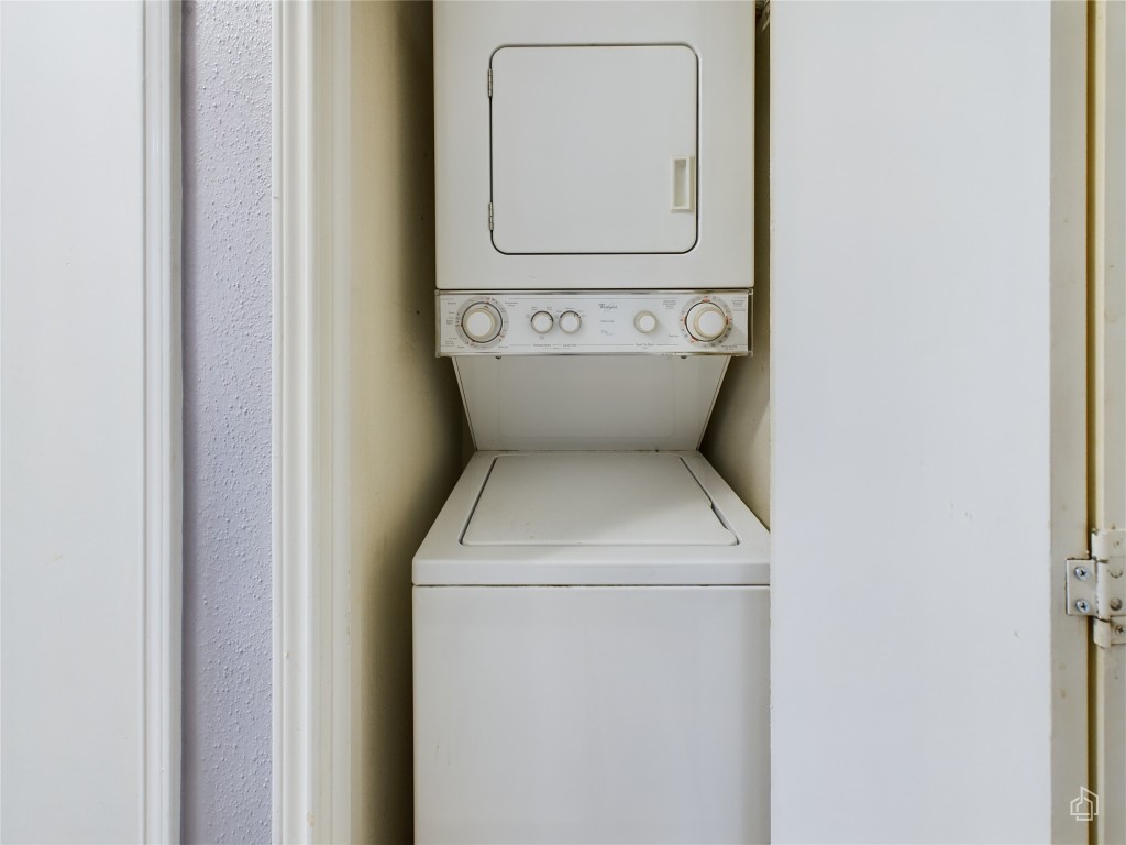 2450 Wickersham Lane, Unit 501 Austin, TX 78741 - Photo 16 of 21 a utility room with dryer and washer
