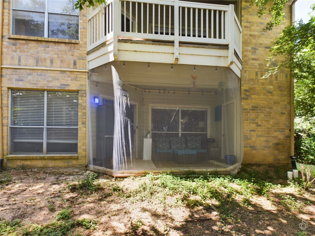 2450 Wickersham Lane, Unit 501 Austin, TX 78741 - Photo 19 of 21 a view of a house with a door and a window