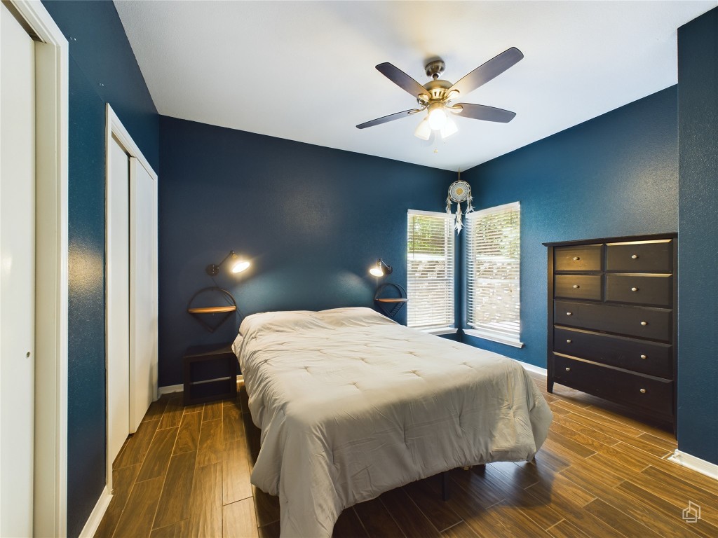 2450 Wickersham Lane, Unit 501 Austin, TX 78741 - Photo 9 of 21 a bedroom with a bed and window