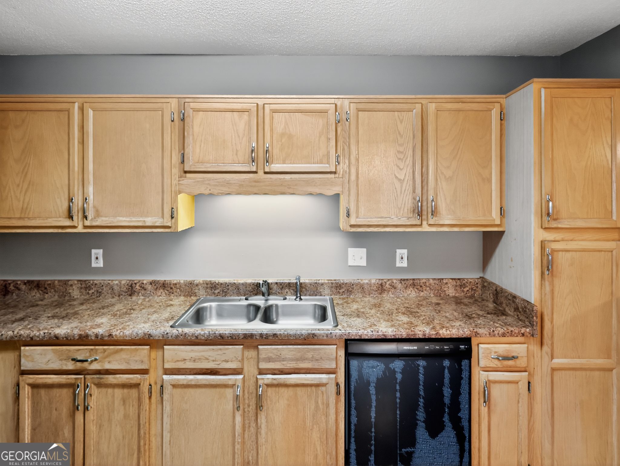 3604 Spring Trace Decatur, GA 30034 - Photo 11 of 32 a kitchen with granite countertop white cabinets and stainless steel appliances