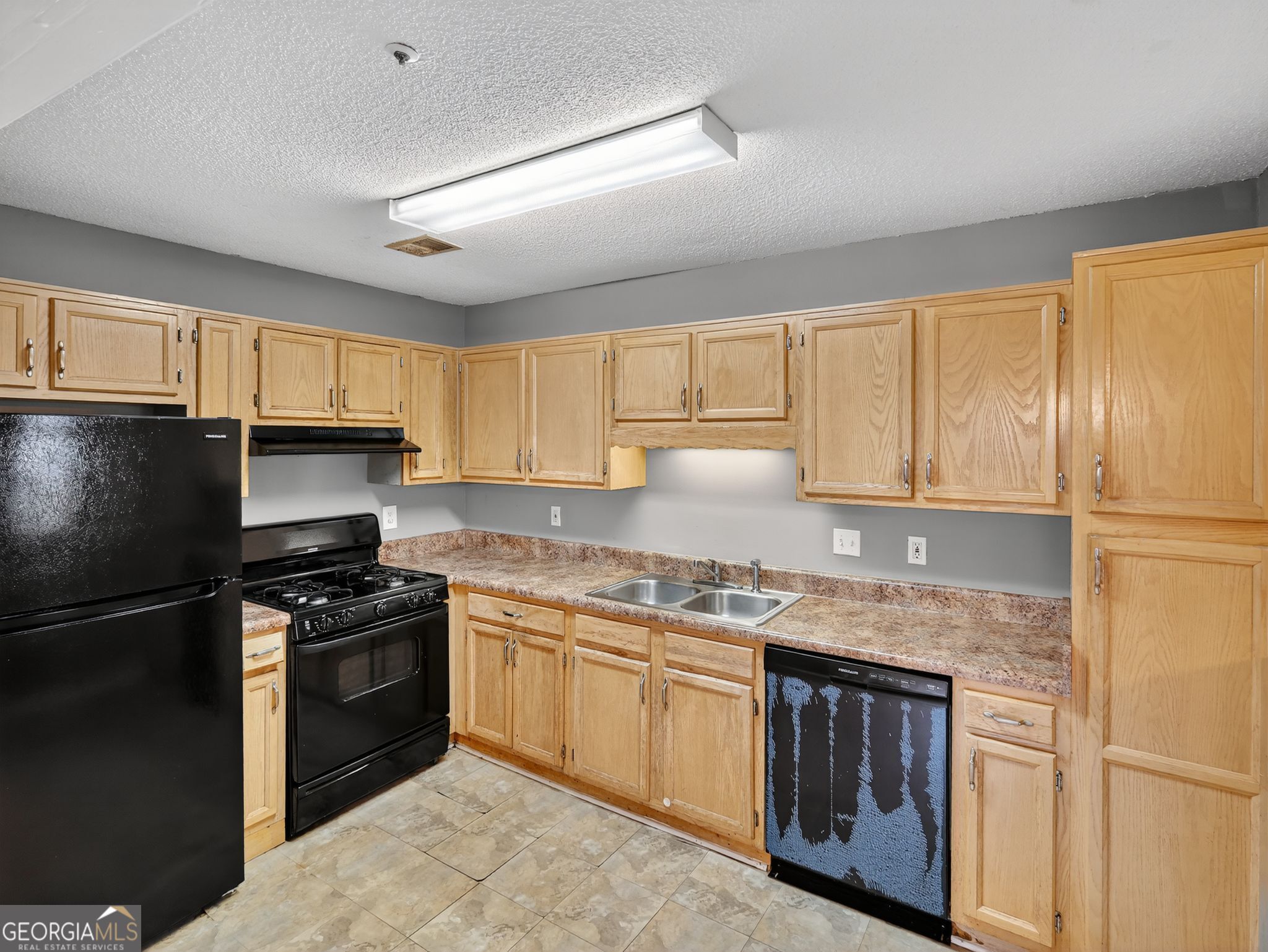 3604 Spring Trace Decatur, GA 30034 - Photo 13 of 32 a kitchen with a sink stove and refrigerator