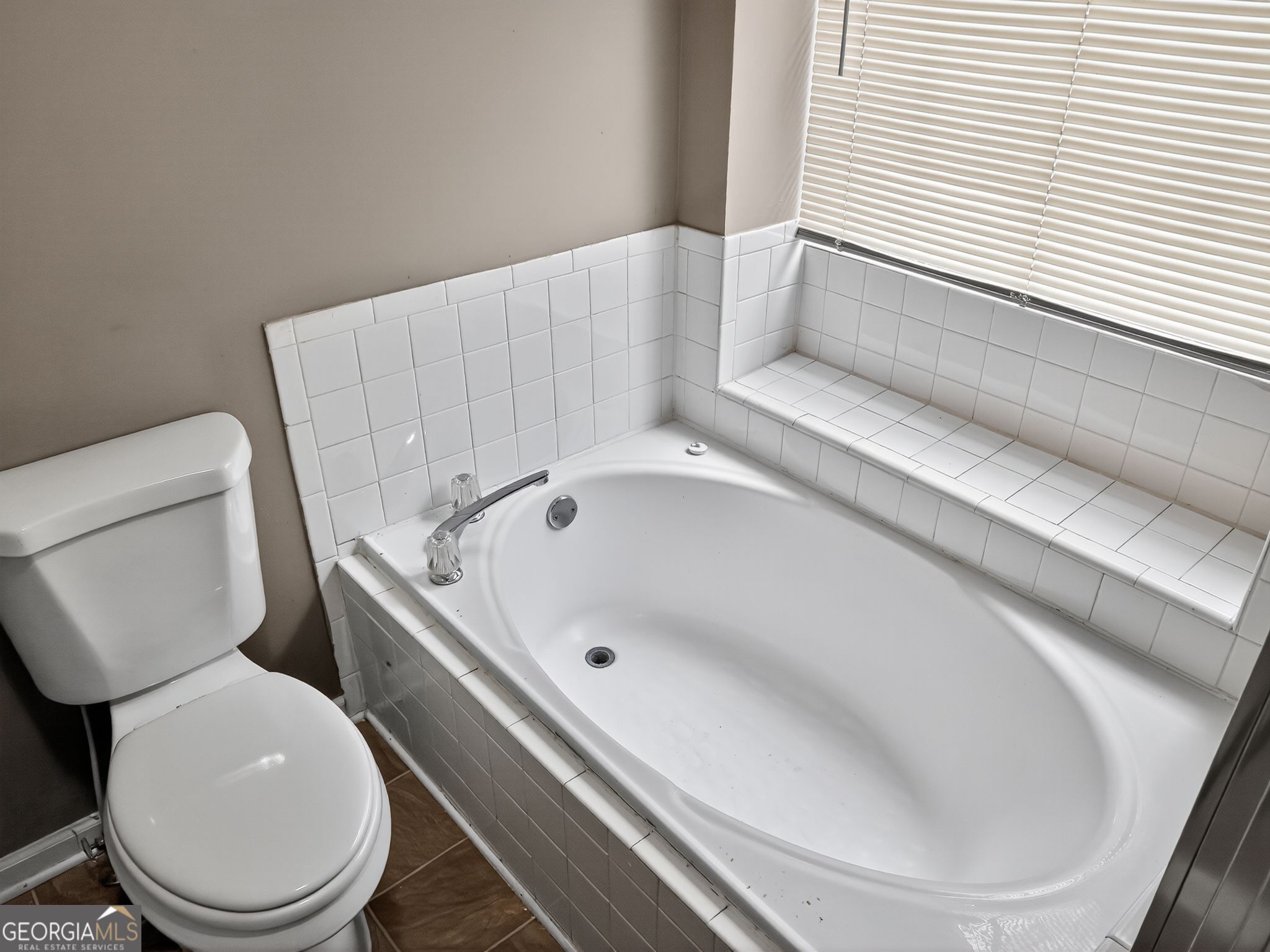 3604 Spring Trace Decatur, GA 30034 - Photo 30 of 32 a bathroom with a toilet and a bathtub