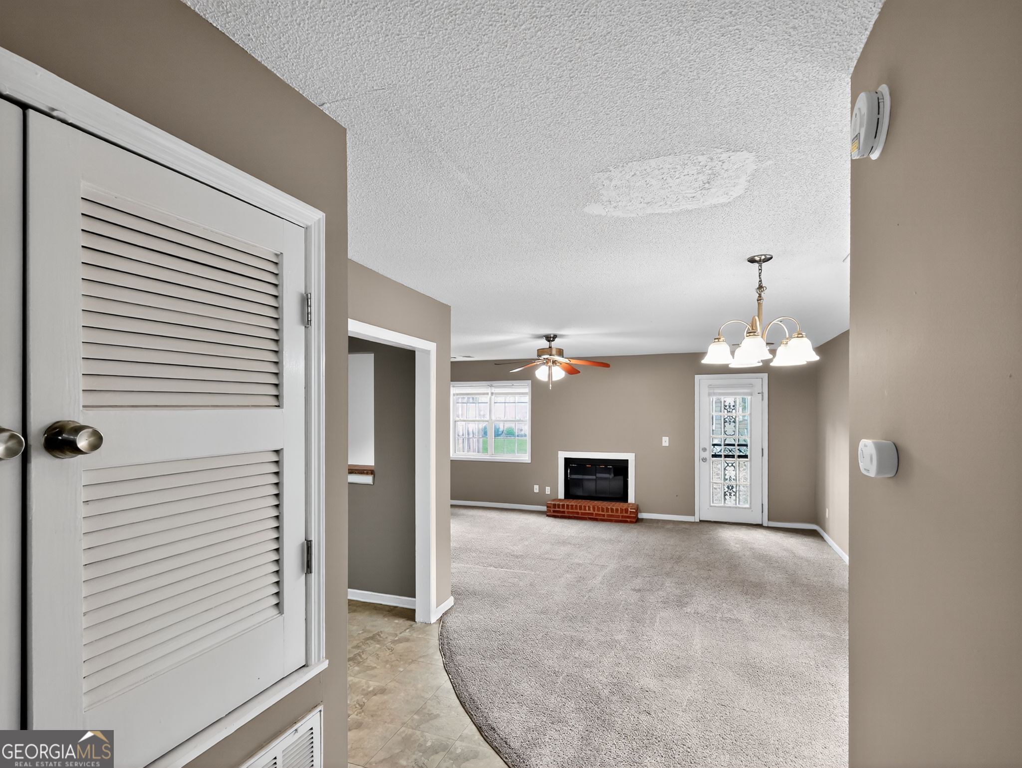 3604 Spring Trace Decatur, GA 30034 - Photo 10 of 32 a view of a livingroom with a chandelier